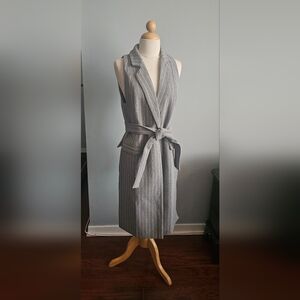 C/MEO Collective black and white two-tone jacket label